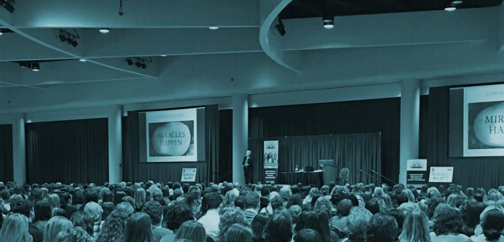 Photo of speaker at NSCLC conference