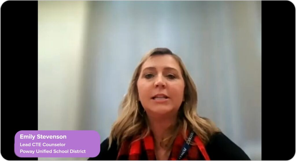 Photo of Emily speaking on video